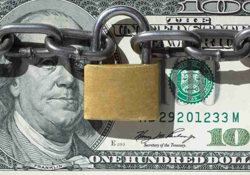 money with lock and chain